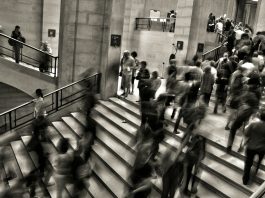 group of people walking on the stairs