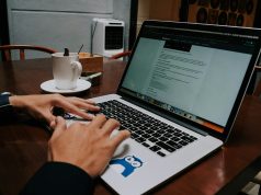 Вештачката интелигенција го менува безбедносниот пејсаж: Како да се заштитите во 2025 година a person using a laptop on a wooden table